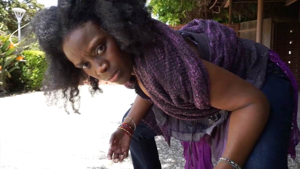 Film still, image of dancer Latanya d. Tigner from the film <em>ruminations</em> by laura elaine ellis.