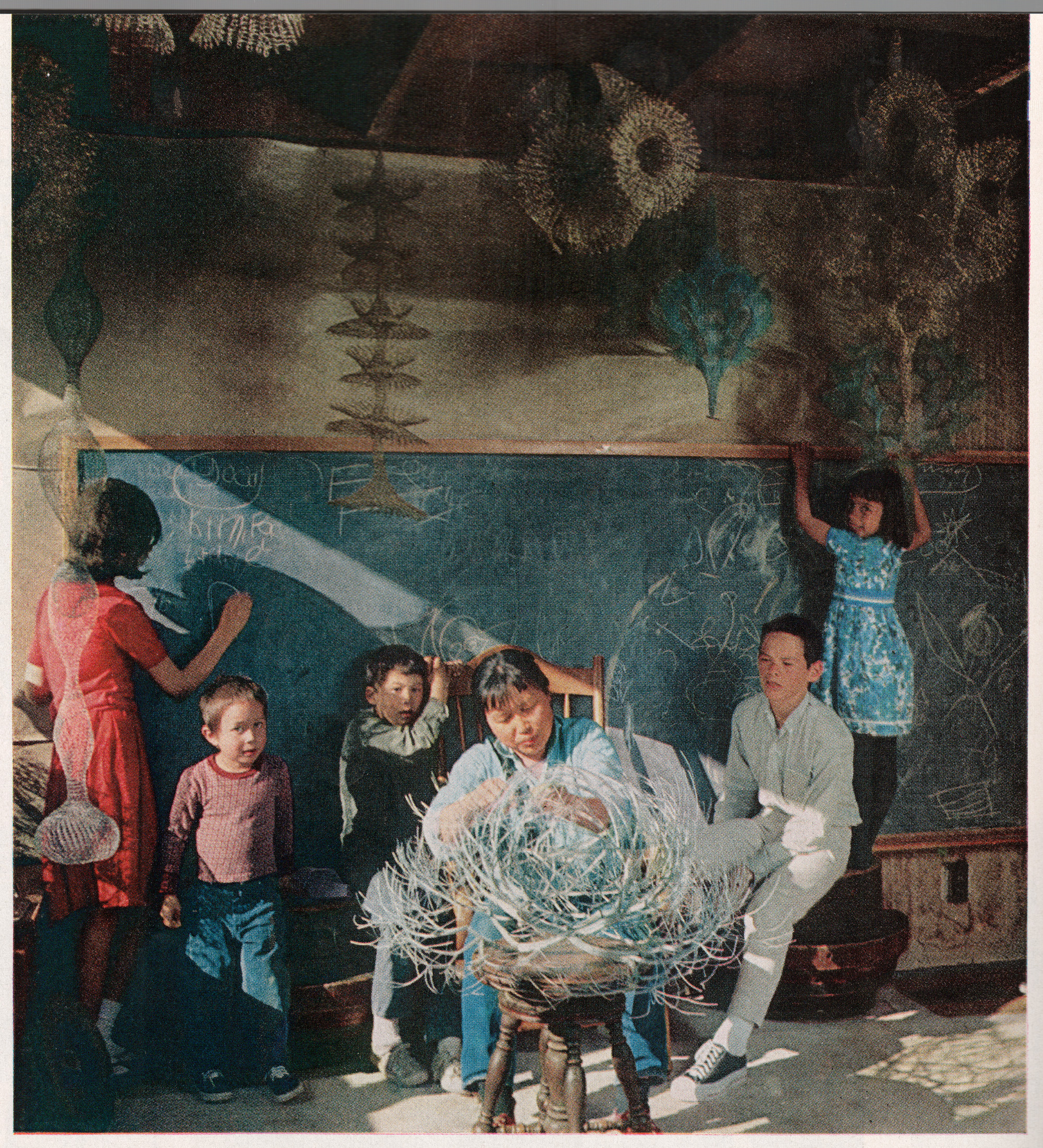 Ruth Asawa and her children in the sunroom of her San Francisco home, 1964. Photo by Ernst Beadle. Artwork © 2026 Ruth Asawa Lanier, Inc., Courtesy David Zwirner