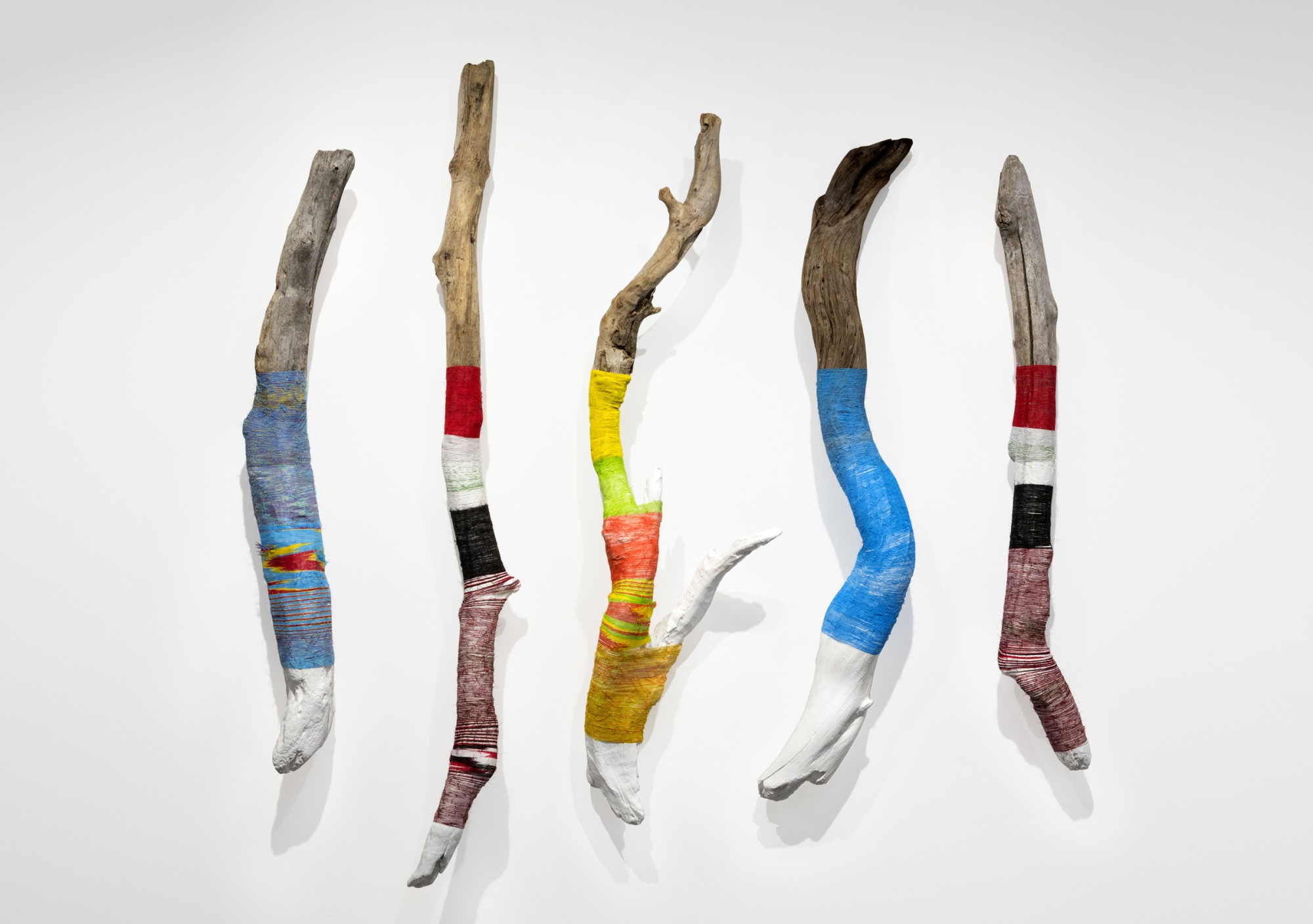 Brian Singer, “Driftwood,” wood, flags from Dem. Rep. Congo, Iraq, Burma, Somalia, Syria 75 x 60 x 5”