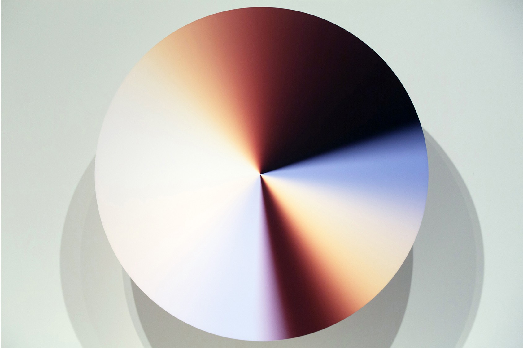 Katie Paterson, <em>The Cosmic Spectrum</em>, 2019, spinning disk, printed vinyl, motor. Photo by Manu Palomeque © Katie Paterson 2022. Courtesy of the artist and James Cohan, New York.