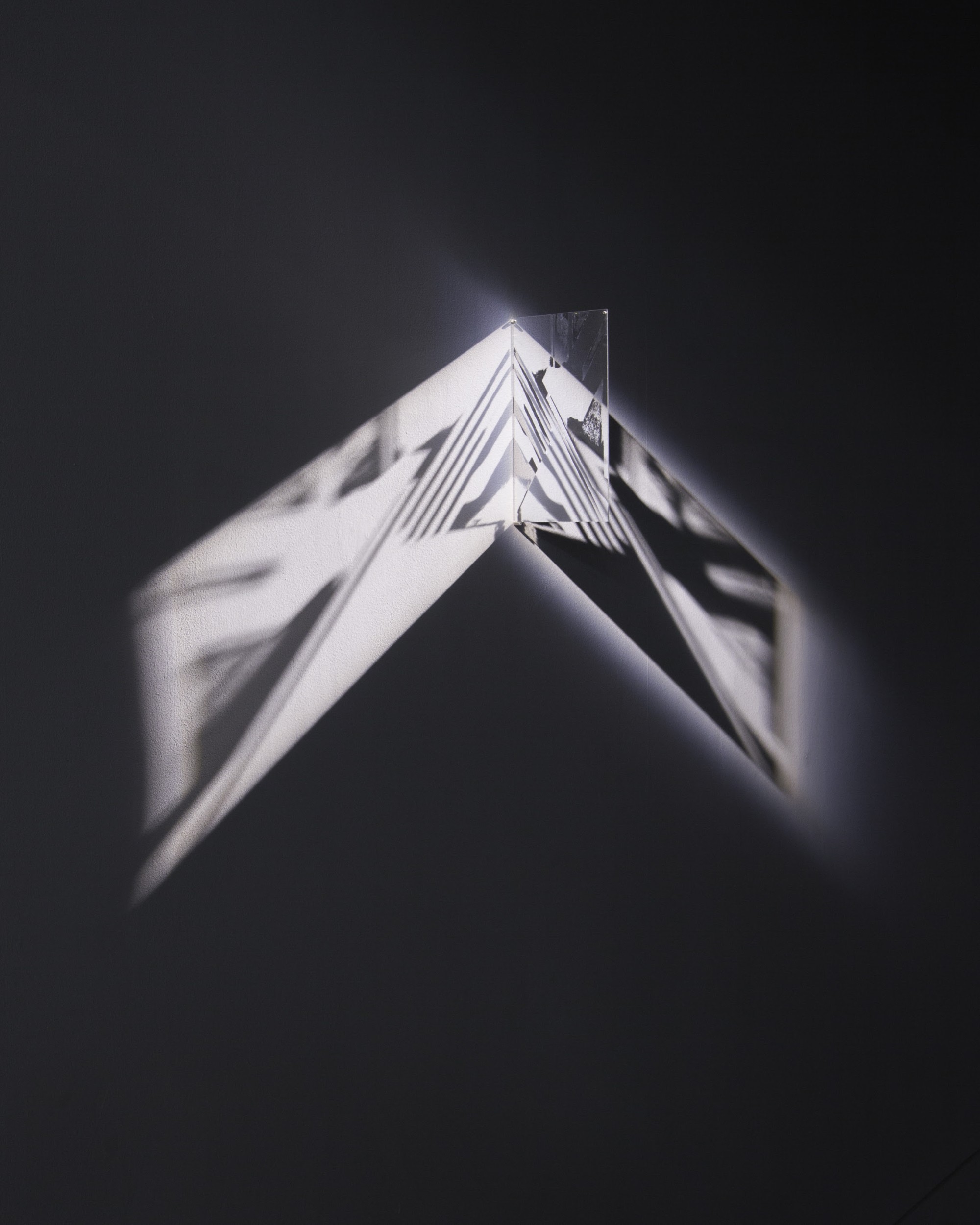 Andy Vogt, Ever Diametric, Acrylic mirror panel, edge-mounted custom hardware, rented light 12 in x 9 in.