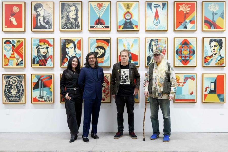 Partner and director of Hashimoto Contemporary Jennifer Rizzo, from left, Ken Hashimoto Harman, Shepard Fairey and Carlo McCormick pose at the artist’s reception for “Shepard Fairy: Fractured.”